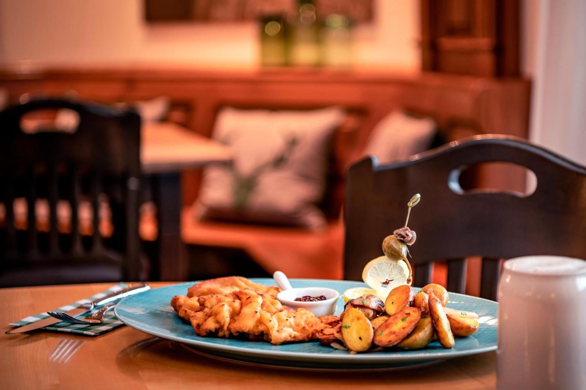 فندق ذا ويستن جراند ميونيخ المظهر الخارجي الصورة A plate of fish and chips